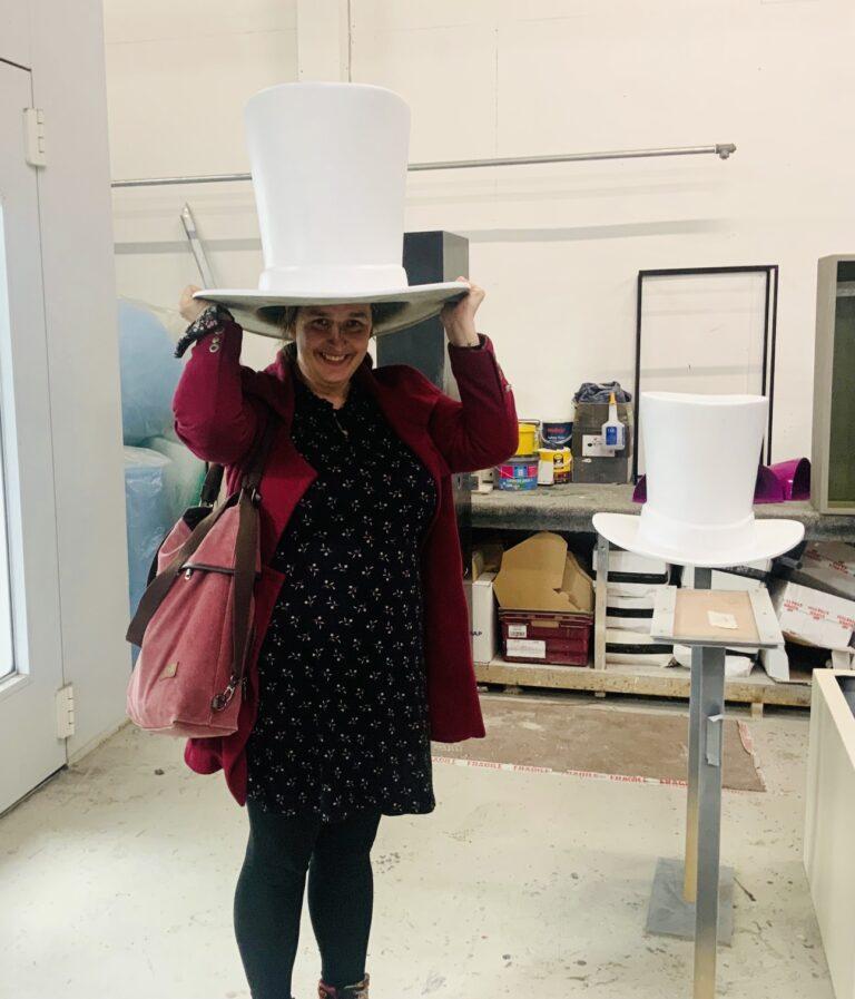 Trail producer Caroline Coates modelling one of the smaller hats