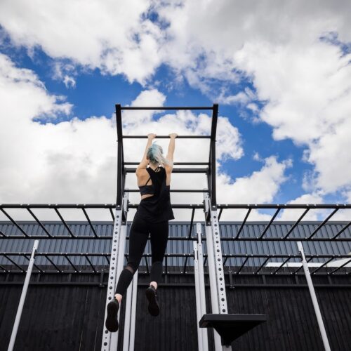 woman using outdoor functional equipment