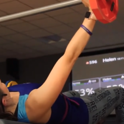 women doing a chest press in myzone class