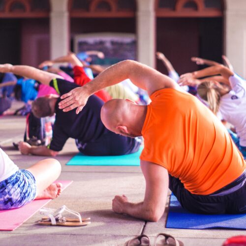 people stretching in an exercise class