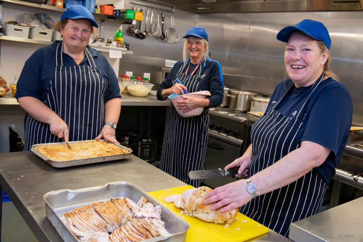 Staff at Beatrix House cafe preparing food